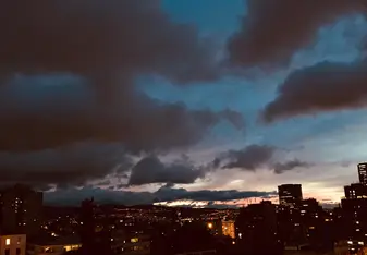 the sun setting over the city
