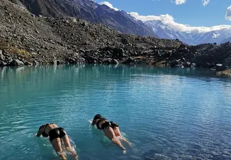No better way to cool off after a full day of hiking Mueller Hut than a quick swim at the Tasman Glacier. 