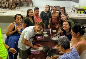 Teen group with Costa Rican mamas make tortillas