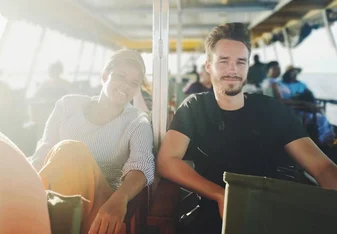 Two volunteers on a Travel van heading to Victoria Falls.