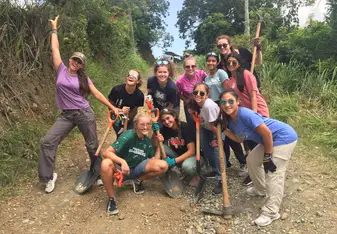 A long day of picaxing and shoveling through solid rock for pipes to connect each community to fresh water.