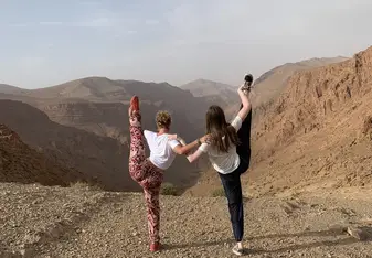 One of my good friends and I posing at the top of a mountain; on a beautiful hike to meet a Nomad family