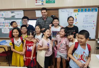 Eddie and one of his classes in an English centre in Vietnam.