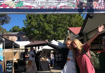Another student and I visiting a local market