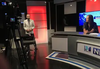 On set with the sports presenter and watching the sports show go out live