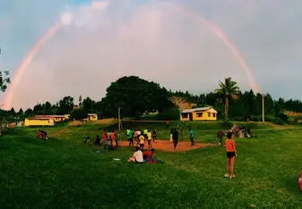 The whole village got together with us to play a giant game of volley ball and the game ended with an amazing rainbow 