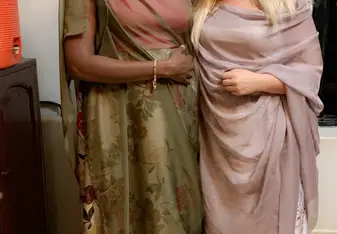 My host mom, Elsie and I wearing traditional Rwandan dresses, umushanana to a gala dinner.