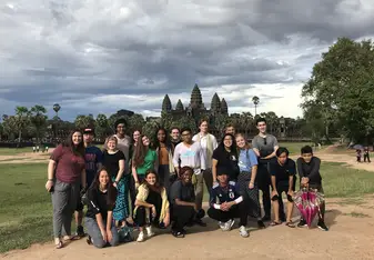 Us in front of Angkor Wat, the largest temple in the world