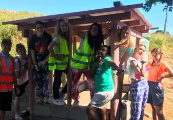 My service group at a chicken coop we helped build. 