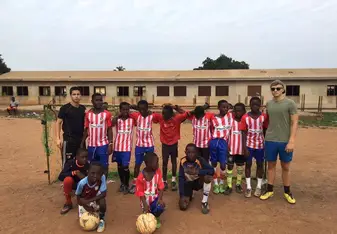 George with football team