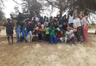 A picture of me and the volunteers with the locals in Senegal.