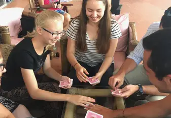 Playing cards with friends.