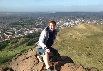 Sitting on Arthur’s Seat, Edinburgh 