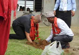 George planting a tree