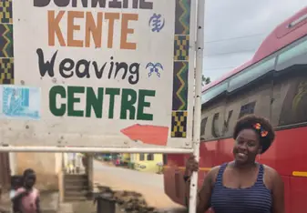 Me after learning about the philosophies and meanings behind kente cloth weaving!