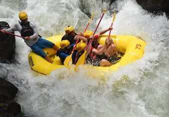 White water rafting in level 3 rapids.