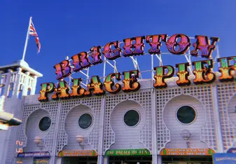 A picture of a pier with the heading “Brighton palace pier”