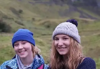 My best friend, Liv, and I after a rainy hike in the Irish countryside