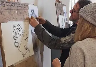 Myself getting direction from our charcoal workshop teacher, artist Michael Wann