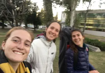 My friends Rocío, Guille, and I after hockey practice as they walk with me to English Talk 