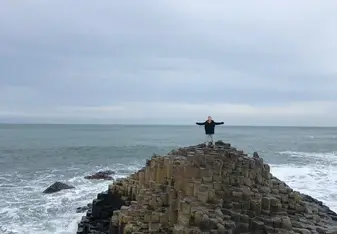 On top of the rocks at Giant's Causeway in Northern Ireland. This was included as one of the AIFS trips and was the best trip! 