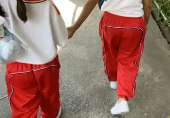 Two students walking to class