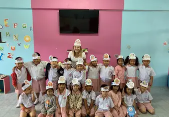 Celebrating Thanksgiving with one of my classes.  We talked about what we are thankful for and made turkey hats!
