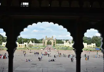 From the inside of Mysore Palace, a stop on our weekend to Mysore and Coorg. Yellow arches and blue skies.