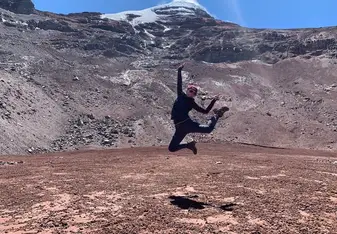 Jumping at the base camp two of the volcano Chimborazo