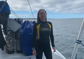Smiling after finishing a snorkeling session in the Galapagos