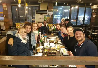 Having a meal with some teachers.
