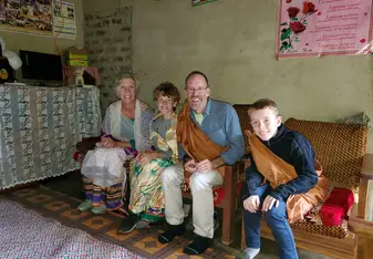 Our family preparing for a naming ceremony at the home of a Ugandan family