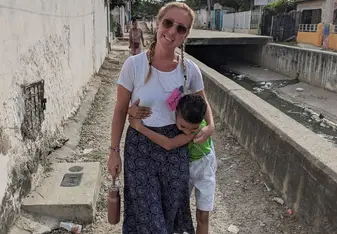 Stephanie with one of the children from the Boston neighborhood
