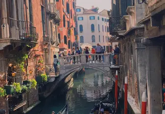 A canal with gondolas in Venice.