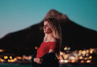 Standing on the beach during sunset with Lion's Head in the background
