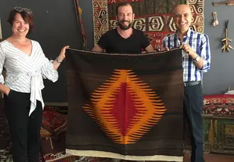 Visiting a Turkish carpet showroom in Cappadocia.