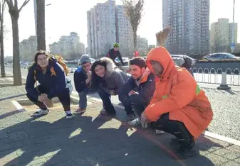 Local teaching us the Asian Squat  