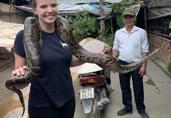 Holding a snake