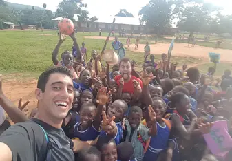 Playing ball with the local kids