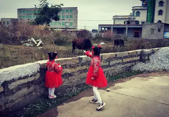 My two little girls dressed up for Chinese New Year. On the countryside visting family.