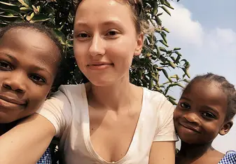 Myself with a couple of children during playtime!