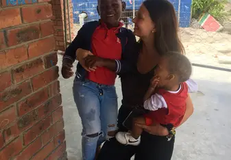 Another picture of an older kid and a baby! 