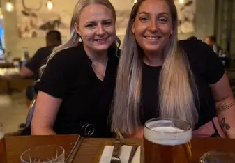 Two happy girls at their birthday dinner in Windhoek, Namibia.