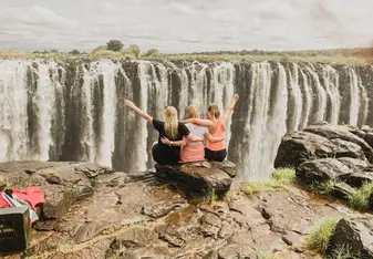 Three girls at the Victoria Falls in Zimbabwe.