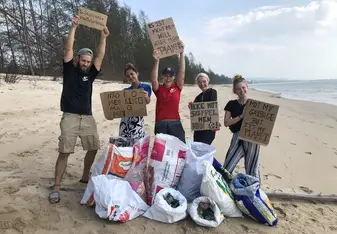 At our booth from the village 1 hour of beach free of garbage