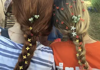 The students love braiding hair!
