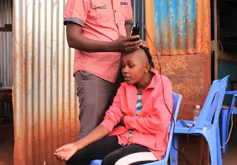 Francis is not only a guard but also a hairdresser haha. He was shaving hair for all the kids due to their school's rule.