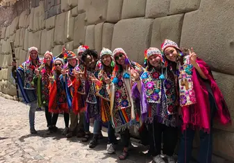 This was in Peru. When we went by the shops the ladies brought us in and dressed us up to take photos