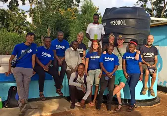 Project team with completed hand-washing station - Muungano - April 2018