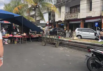 Streets with bikes, tents and people